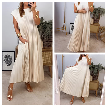 Elegant cream sleeveless maxi dress with a flowy summer pleated design in beige, size 3XL, displayed on a mannequin.