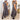 Elegant black sleeveless maxi dress in a flowy summer pleated design, showcasing a one-piece garment with a fitted neckline and armholes, suitable for day wear.