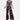 Elegant floral off-shoulder denim jumpsuit in dark blue, showcasing a luxurious women's one-piece garment with a focus on the shoulder and neck area, highlighting the stylish design and textile details.
