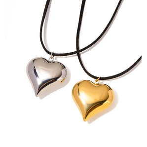 Elegant gold and silver heart lockets necklace for women with a delicate chain, perfect romantic gift jewelry.