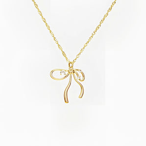 Elegant gold star and pearl pendant necklace with layered chains, featuring a delicate design and trendy aesthetic.