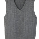Elegant gray cable knit sleeveless men's wool sweater vest featuring a woven pattern design.
