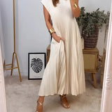 Elegant grey pleated midi dress with side cut-outs, featuring a beige color in a size 3XL. The dress has long sleeves and a fitted waist, highlighting the shoulder and neck areas.