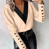 Elegant light pink blouse for women featuring button sleeves, shown in khaki color and size 2XL, highlighting the shoulder, neck, and collar area.
