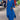 Elegant long black maxi dress with high collar and pockets displayed on a mannequin, featuring a flowing silhouette and stylish sleeves, perfect for formal occasions.