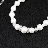 Elegant long pearl bridal back-drop necklace with delicate pearl beads, designed as wedding jewelry.