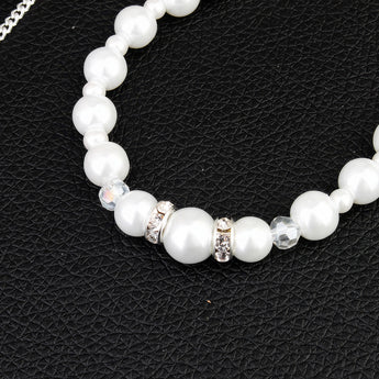 Elegant long pearl bridal back-drop necklace with delicate pearl beads, designed as wedding jewelry.