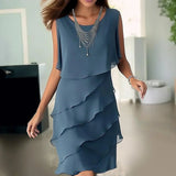 Elegant navy blue tiered ruffle dress in a lightweight, flowy design, ideal for summer; showcased in size 2XL, featuring a one-piece garment style with distinct shoulder and waist detailing.