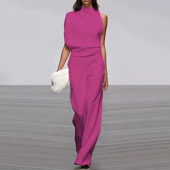 Elegant green one-shoulder evening gown on a mannequin, showcasing its sheath silhouette and formal design with attention to waistline and shoulder detailing.