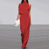 Elegant one-shoulder evening gown in red, featuring a fitted waist and flowing design, suitable for formal occasions.