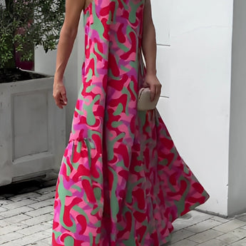 Elegant one-shoulder pink camo evening maxi dress for women, featuring a fitted waist, flowing skirt, and unique asymmetrical neckline.