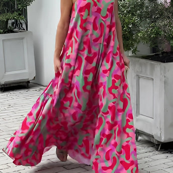 Elegant pink camo evening maxi dress for women featuring a one-shoulder design with a fitted waist and flowing hemline.