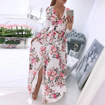 Elegant white floral maxi dress featuring long sleeves, deep V-neckline, and a high slit design, suitable for plus size (2XL).
