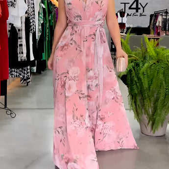 Elegant pink floral sleeveless V-neck maxi dress ideal for spring weddings, showcasing a fitted waist and flowing skirt.