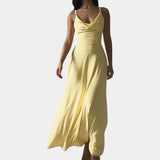 Elegant plus size yellow maxi dress featuring a cowl neck and sleeveless design suitable for formal occasions.
