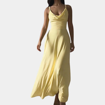 Elegant plus size yellow maxi dress featuring a cowl neck and sleeveless design suitable for formal occasions.