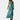 Elegant plus size emerald green maxi dress with a cowl neck and sleeveless design, showcasing a flowing silhouette.