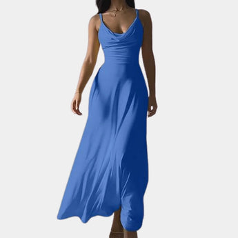 Elegant blue plus size maxi dress featuring a cowl neck and sleeveless design, highlighting the shoulders and waist.