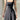 Elegant teal midi dress in a sleeveless fit and flare style, perfect for formal events, shown in Nero color in size 3XL, highlighting details such as the neckline, arm, and shoulder design.