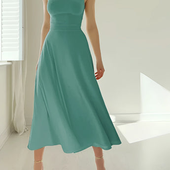 Elegant teal midi dress in a sleeveless fit and flare design, suitable for formal events, featuring a fitted bodice, flared skirt, and a smooth neckline for an elegant silhouette.