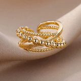 Elegant Textured Gold Bead Ring displayed against a neutral background, highlighting its premium designer craftsmanship.