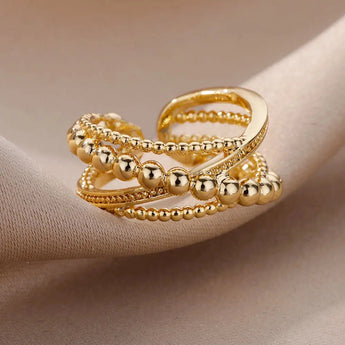 Elegant Textured Gold Bead Ring displayed against a neutral background, highlighting its premium designer craftsmanship.