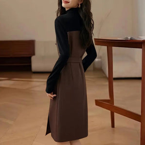 Elegant two-tone midi dress featuring a slim fit design, knee-length hemline, and structured grey fabric, perfect for office wear.