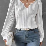 Elegant V-Neck Pleated White Blouse in Bianco1 color, featuring a stylish fit for both office and casual wear, displayed on a mannequin showcasing the shoulder and neck design.