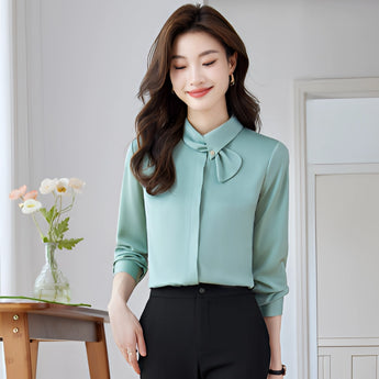 Elegant white bow tie blouse in turquoise, featuring long sleeves and a chic design suitable for office or formal events, displayed in size 2XL.