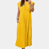 Yellow XL Elegant White Midi Pleated Dress displayed with focus on the pleated design, sleeveless top, and mid-length hem suitable for casual summer chic wear.