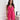 Woman wearing an elegant white sleeveless V-neck belted formal jumpsuit.