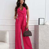 Elegant white sleeveless V-neck belted formal jumpsuit for women, showcasing a fitted waist, stylish shoulder design, and tailored thighs.