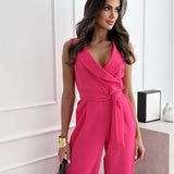Elegant white sleeveless V-neck belted formal jumpsuit for women with a fitted waist and chic design.