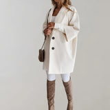 Elegant women's beige oversized wool coat with a high-collar design, featuring long sleeves and a stylish, tailored fit suitable for winter wear, shown in a 2XL size.