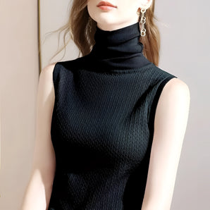 Elegant women's black sleeveless turtleneck top in 3XL size, featuring a high neckline and fitted design suitable for office and fashion wear.