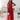 Elegant women's formal pink maxi dress with a V-neckline, styled as a one-piece garment. The dress is designed for bridesmaid and evening occasions, featuring a fitted waist and flowing thigh-length skirt. The model with black hair showcases the gown's fashion design and formal wear appeal.