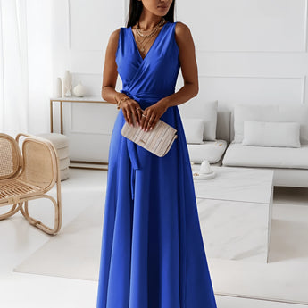 Elegant women's formal blue V-neck maxi dress with sleeves, designed as a one-piece garment. Suitable for bridesmaids and evening occasions, featuring a fitted waist and flowing silhouette that reaches the thighs. Fashionable and stylish in electric blue.