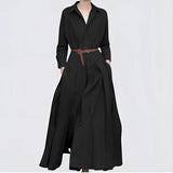 Elegant women's grey wool blend maxi trench coat featuring a wide collar, long sleeves, and a sophisticated design, suitable for formal wear.
