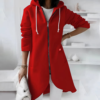 Elegant women's long hooded cardigan in vibrant red with an asymmetrical zipper. The cardigan is designed with a stylish collar and long sleeves, offering a fashionable and unique outerwear piece. The garment is available in size 5XL, providing a comfortable and flattering fit.