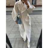 Elegant Women's Oversized White Wool Coat - Double-Breasted Long Winter Coat, White, 2XL, featuring a wide collar, long sleeves, and a tailored fit. The model is wearing the coat over a dress shirt, showcasing the full length and double-breasted design.