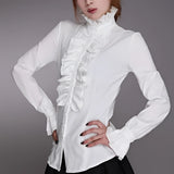 Elegant women's ruffle blouse in white, featuring long sleeves, a ruffled collar, and a classic French fashion design. The blouse is styled on a mannequin showcasing the 2XL size, emphasizing the waist and neck area.