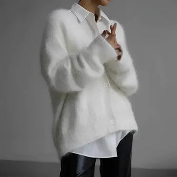 Elegant women's soft fur oversized sweater in white, XL size, featuring plush material and long sleeves, suitable for winter fashion.