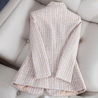 Elegant Women's Tweed Blazer in chic monochrome, featuring a formal design suitable for office wear, with a focus on comfort and textile quality.