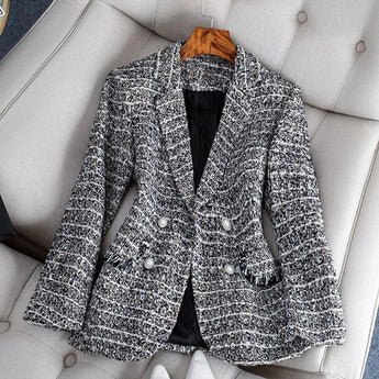 Elegant women's tweed blazer in chic monochrome, featuring a formal office wear design in black, suitable for size 3XL. The blazer exhibits a sophisticated collar and full-length sleeves, crafted from high-quality textile, with a tailored fit reminiscent of a suit jacket style.