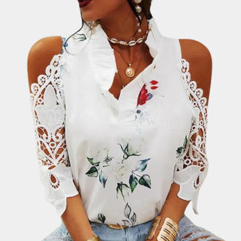 Elegant women's white floral lace cold shoulder bell sleeve top in size 3XL, worn by a model, highlighting the intricate lace pattern and fashionable design, paired with sunglasses.