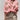 A loose-fitting boho blouse with intricate embroidery, featuring a vibrant red and pink floral pattern. The blouse has long sleeves and a collar, designed in a chic summer fashion style, and is available in size XXL.