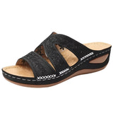 A pair of embroidered floral women's sandals in black, size 43, featuring a comfortable design suitable for summer slides.