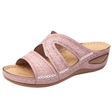 Comfortable blue women's summer slides with embroidered floral design.