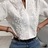 White floral lace blouse with short sleeves and eyelet detailing, shown in XL size.