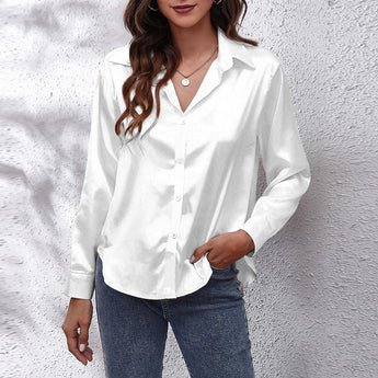 Emerald green satin long sleeve button-down blouse featuring a classic collar and button detailing, suitable for formal or casual wear.